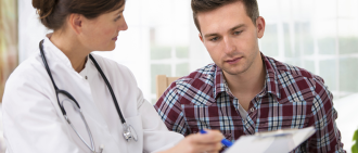 doctor consulting with concussion patient