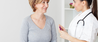 female patient with doctor