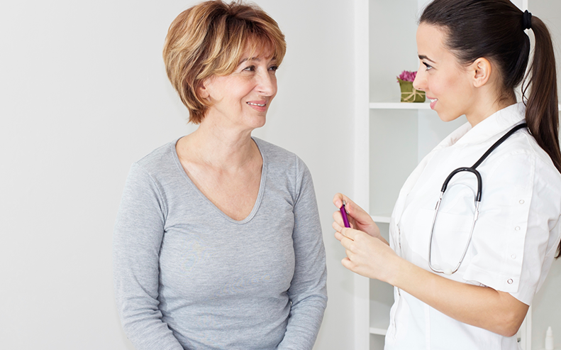 female patient with doctor