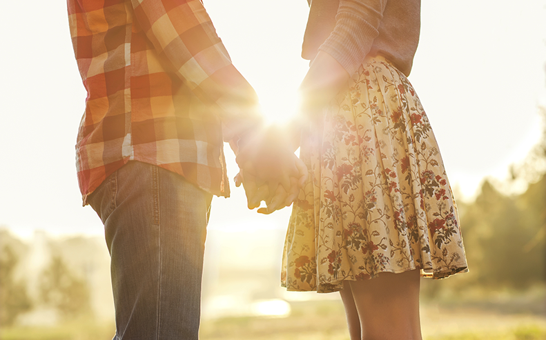 couple holding hands