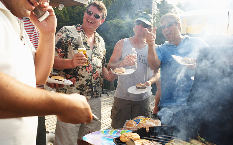 men grilling