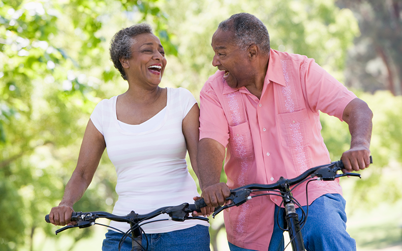 older couple riding bicycles