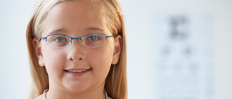 young girl wearing glasses