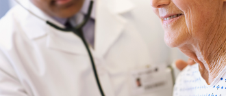 doctor listening to patient's heart