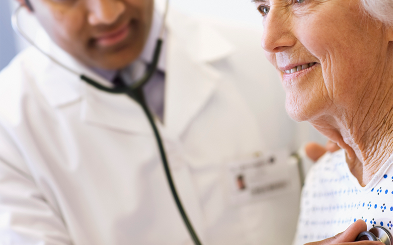 doctor listening to patient's heart