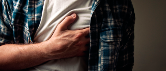 man grabbing chest