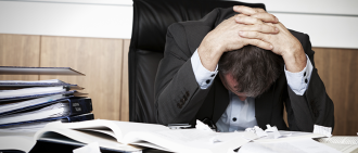 man stressed at work