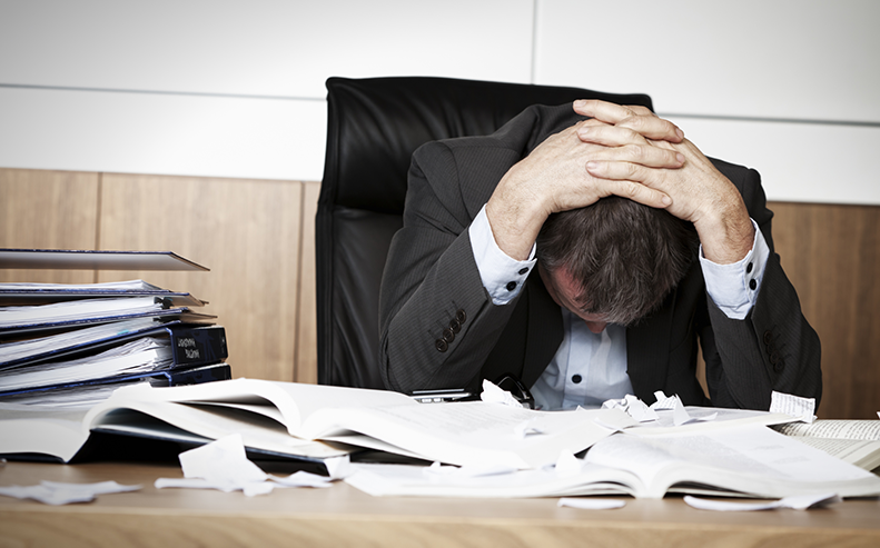 man stressed at work