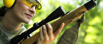 woman with rifle