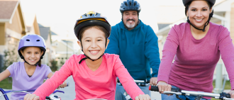 family riding bikes