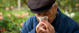 elderly man coughing