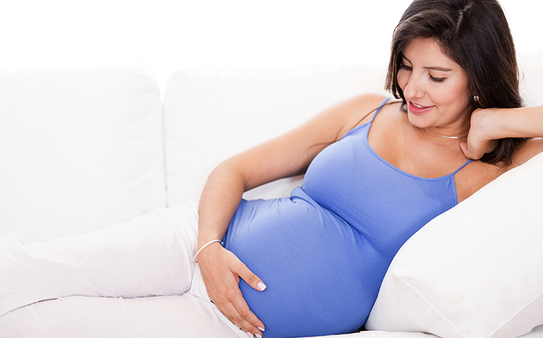 pregnant woman on couh