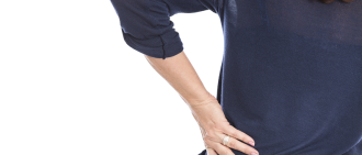 woman holding back