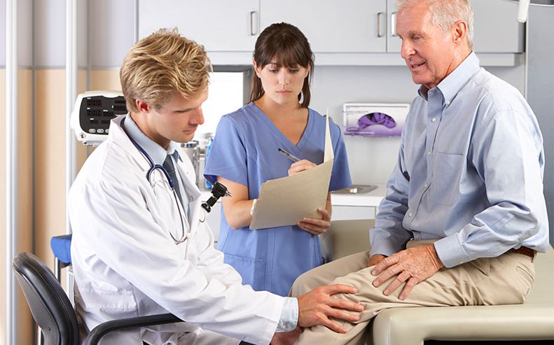 elderly man knee consultation