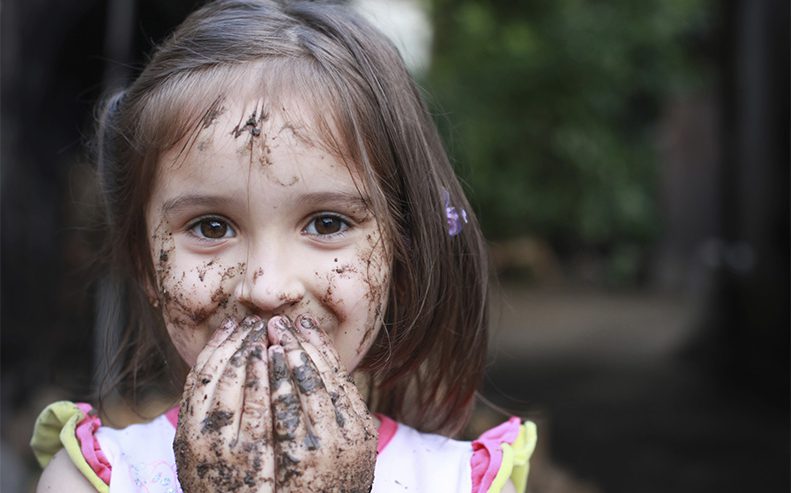 girl covered in dirt