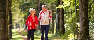 Couple Running in Woods