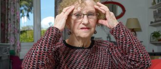 woman experiencing dizziness