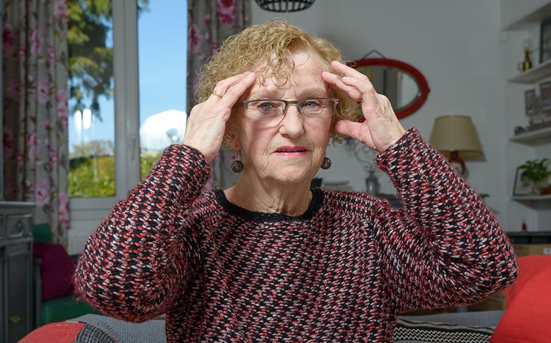 woman experiencing dizziness
