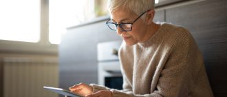 Mature Woman looking at Phone