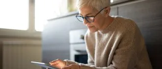 Mature Woman looking at Phone