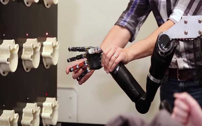 Pitt-UPMC researchers help a paralyzed man feel again with the help of a mind-controlled robotic arm