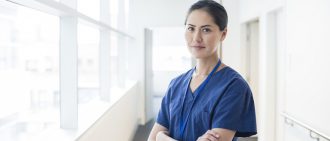 Female physician in scrubs