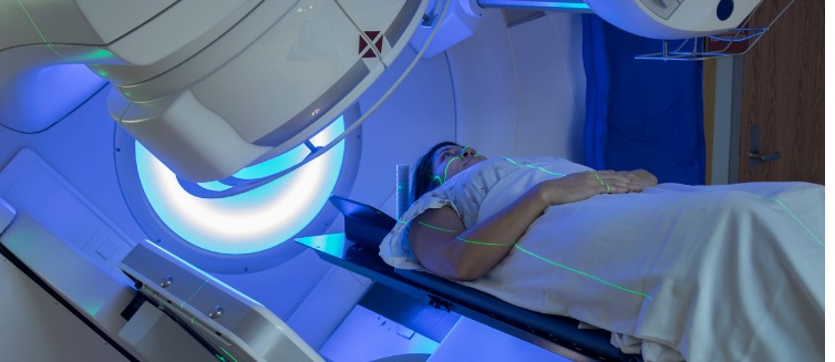 Woman getting external beam radiation