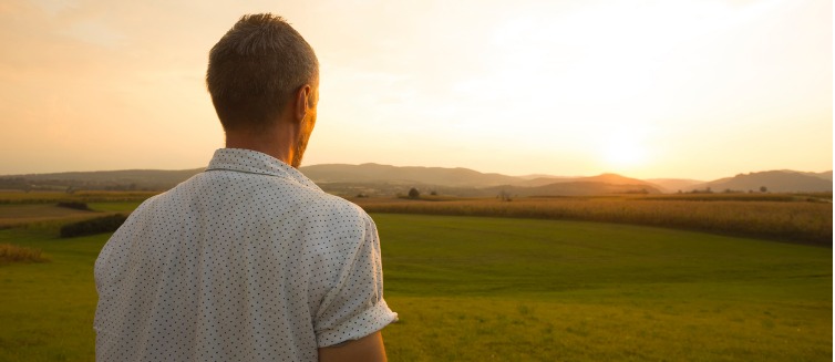 Man looking out at sky
