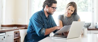 Couple looking at papers