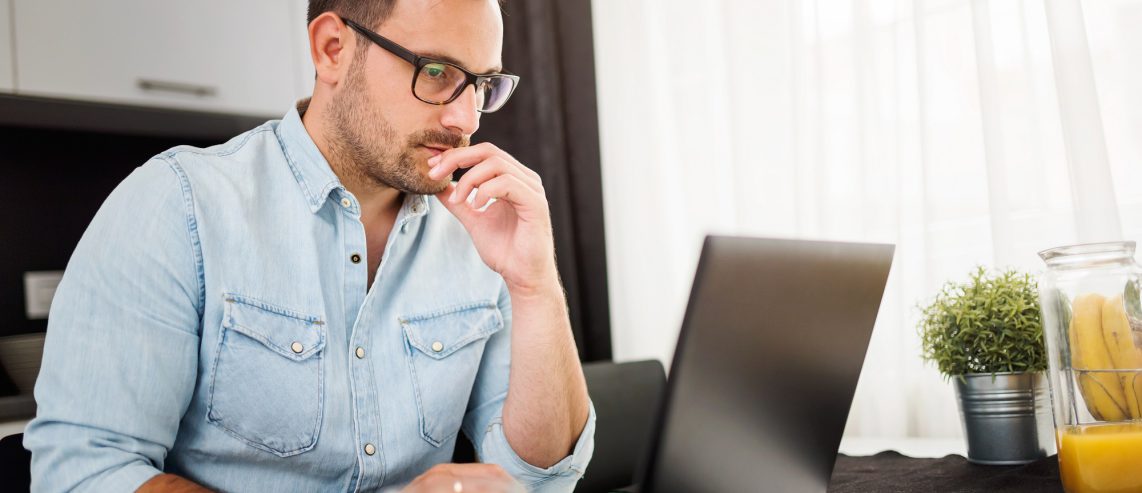 Man researching on the computer