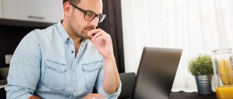 Man researching on the computer