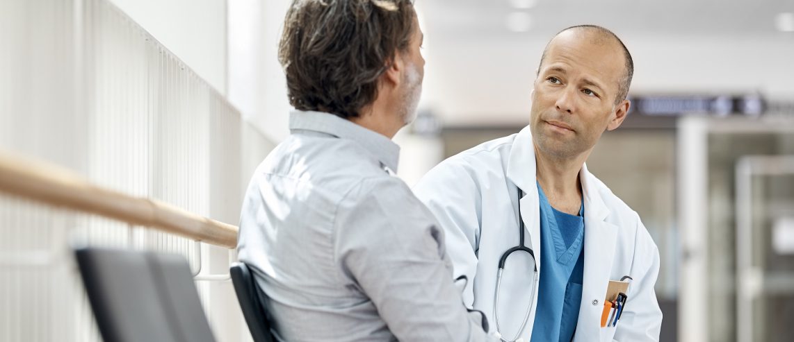 Doctor Counseling Male Patient