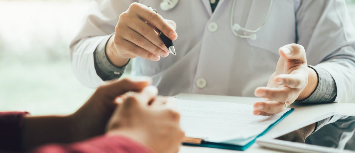 Doctor talking to the patient