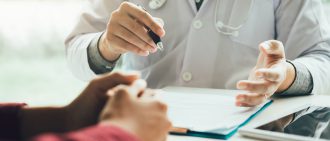 Doctor talking to the patient