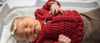 Newborn Baby in Fred Rogers Cardigan