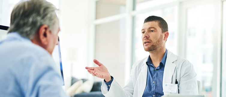 Man talking with doctor