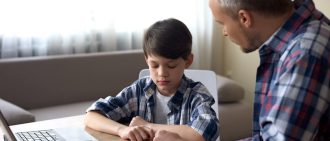 Parent talking to worried child