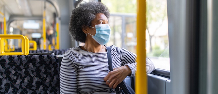 Woman Riding Bus