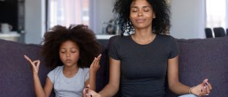 Child and mom meditating