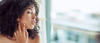 Woman touching face