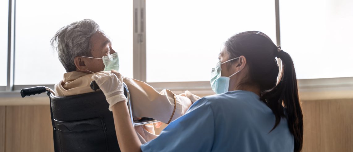 Nurse and Elderly Patient