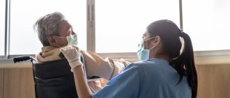 Nurse and Elderly Patient