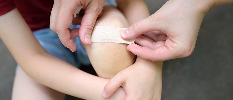 Putting on a bandaid