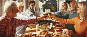 Family having Thanksgiving dinner.