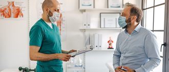Kidney Transplant Recipient talking to doctor