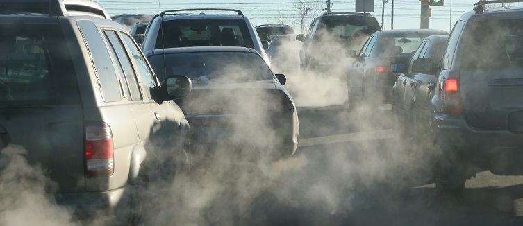 Polluting clouds of exhaust fumes rise in the air