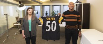 Carrie and Ryan Holding Jersey