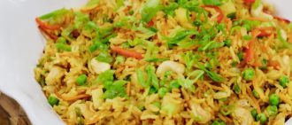Transport your taste buds with our Thai Pineapple Fried Rice recipe. This dish combines sweet pineapple with savory goodness. Get the recipe.
